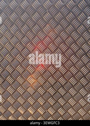 Diamond plate aluminum non slip surface showing metallic pattern and industrial texture Stock Photo