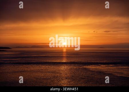 beautiful seascape at sunset with distant volcanic islands on the horizon in Italy Stock Photo