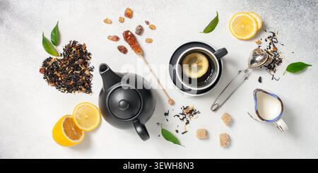 Tea composition on light grey background. Flat lay. Top view. Banner Stock Photo