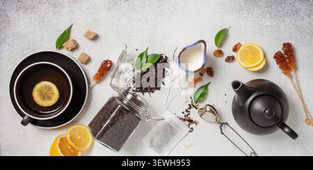 Tea composition on light grey background. Flat lay. Top view. Banner Stock Photo