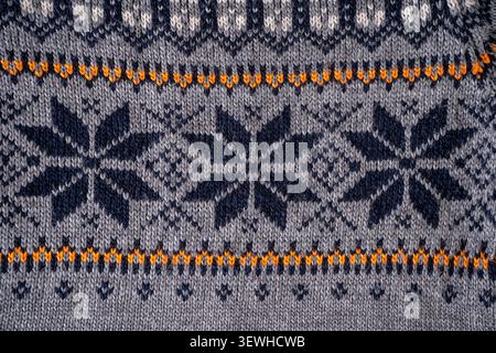 Nordic Knit Pattern Background. Texture Christmas gray sweater Stock Photo