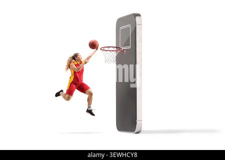 Woman playing basketball on a smartphone isolated on white background Stock Photo