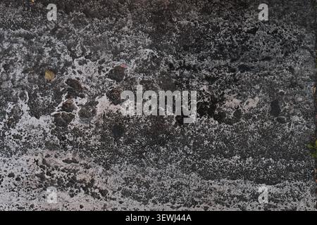 ABSTRACT BACKGROUND TEXTURE OLD CRACKED ASPHALT PAVEMENT Stock Photo