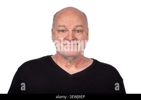 Middle Aged Man in Black Shirt Looking at Camera - Isolated Studio Portrait on White Background Stock Photo