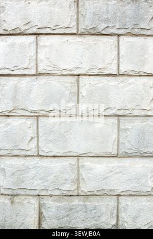 Grey stone brick wall pattern vertical texture backdrop Stock Photo