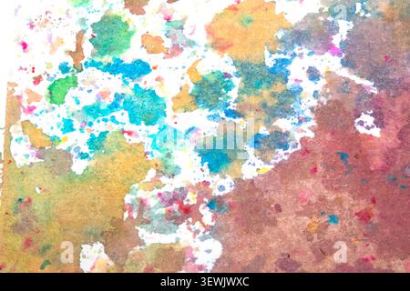 Vibrant rainbow watercolour paint circles dots and spots on white background Stock Photo