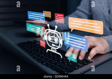AI chatbot communication and automated customer support concept. Person using laptop, virtual assistant, chat bubble, instant message, online helpdesk Stock Photo