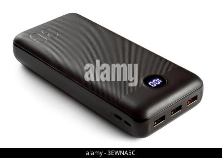 A modern power bank with charge indication on a white background. Battery for charging devices. Stock Photo