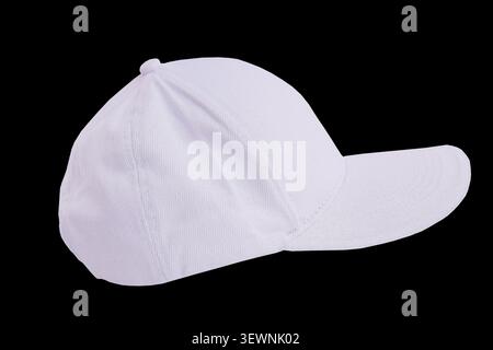 White Cotton Baseball Cap: Blank Twill Unbranded Hat Design isolated on black background. Stock Photo