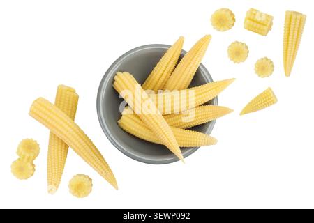 Pickled young baby corn cobs in ceramic bowl isolated on white background Top view. Flat lay Stock Photo