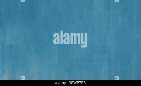 texture of uniformly painted blue metal with a matte surface. Light vertical brushstrokes, fine nap, and faded scuffs are visible. Stock Photo