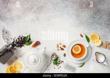 Tea composition on light grey background. Flat lay. Top view. Banner Stock Photo
