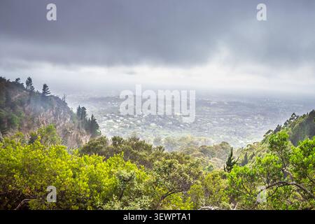 Misty View Over Kirstenbosch and Cape Town from Table Mountain Hiking Trail Stock Photo