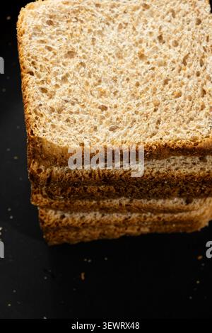Crunchy roasted rye bread slices stacked together, healthy food concept Stock Photo