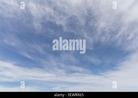 Blue Sky with Scattered White Clouds Stock Photo