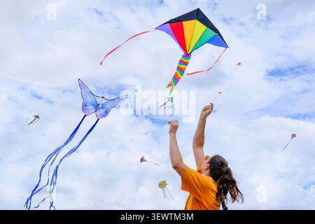 London, UK. 28 June 2026. Adults and children enjoy an afternoon of kite flying at a festival by the Kite Society of Great Britain on Hampstead Heath. Stock Photo