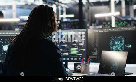 Software developer uses node tree software to identify equipment performance issues and data patterns. Stock Photo