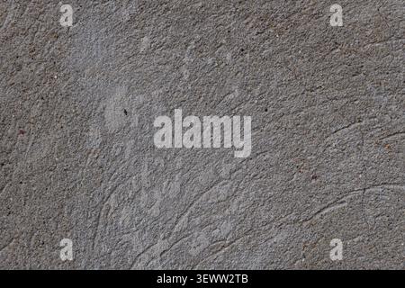 Neutral Gray Cementitious Surface Backdrop Abrasive Stone-like Material with Gentle Relief Perfect for Subtle Abstract Wallpapers and Soft Focus Graph Stock Photo