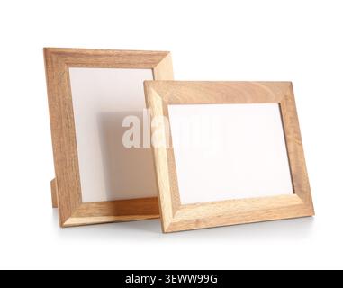 Two empty wooden photo frames on white background Stock Photo