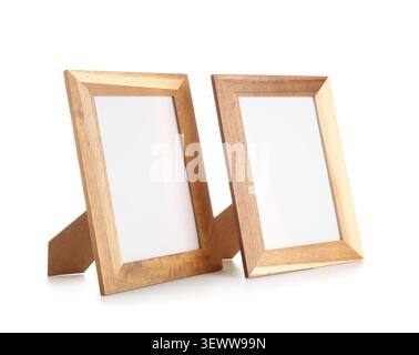 Two empty wooden photo frames on white background Stock Photo