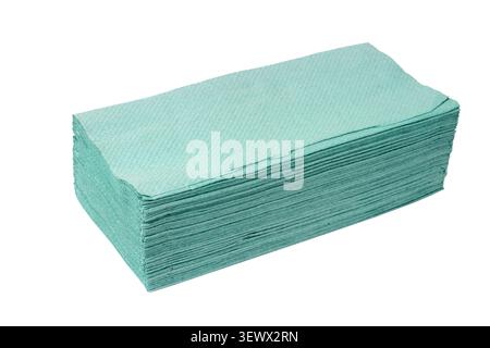 Stack of green paper towels isolated on white background. Close-up of paper towels. Stock Photo