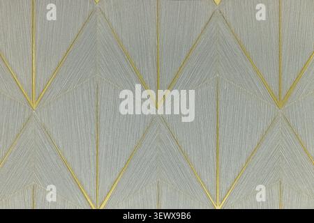 Geometric gold lines on grey textured tapestry background Stock Photo