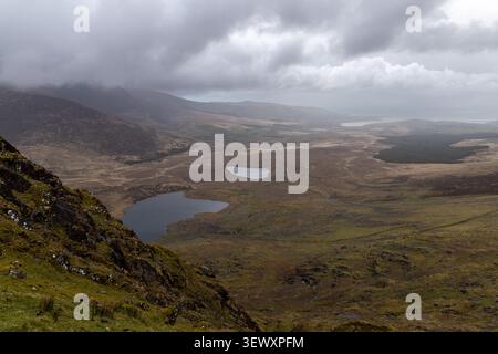 Scenic view from Conor Pass under a dramatic cloudy sky, County Kerry, Ireland Stock Photo