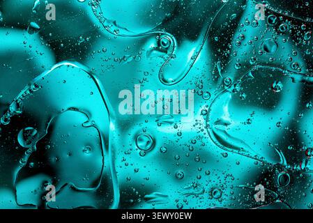 Dark green and aqua fluid texture with organic chemical bubbles Stock Photo