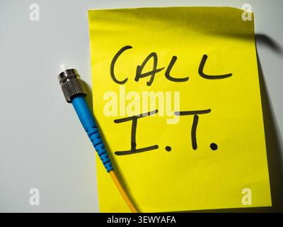 Reminder note to call network technician  Stock Photo
