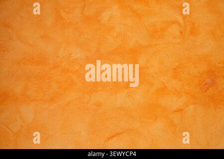 Soft burnt orange surface featuring gentle shading and grain Stock Photo