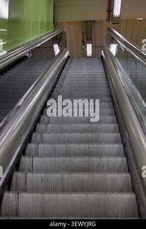 An empty escalator stairs in Madrid metro station. Stock Photo