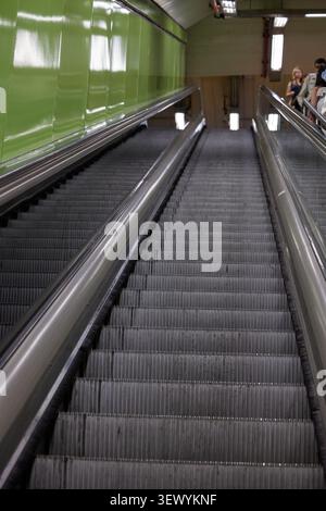 An empty escalator stairs in Madrid metro station. Madrid, Spain - June 12, 2024. Stock Photo