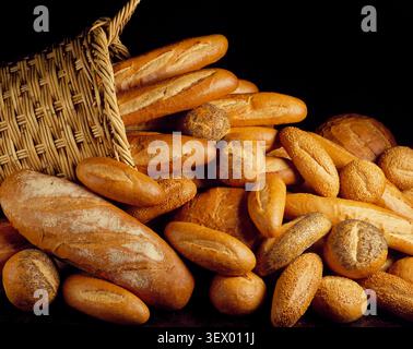 Still life. Food. Bread loaves in basket. Stock Photo