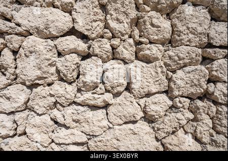 Abstract part of an old stone fence Stock Photo