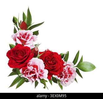 Red roses and carnation flowers with green leaves of ruscus in a floral corner arrangement isolated on white background Stock Photo