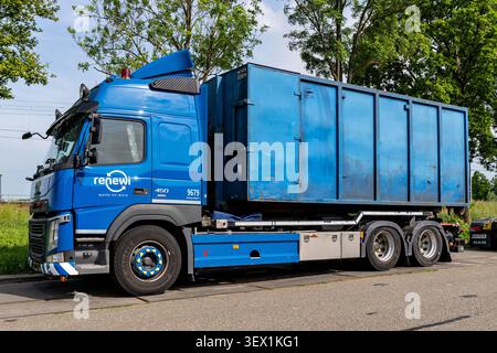 Renewi Volvo FM roll-off container truck Stock Photo