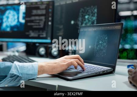 Engineer uses an AI language model assistant in a server hub to handle infrastructure maintenance. Stock Photo
