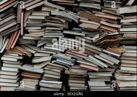 Stack of Old Books Background with Vintage Paper Texture Stock Photo
