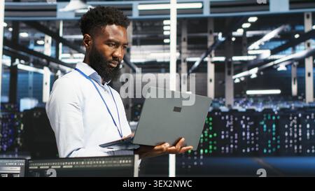 Programmer uses node tree software to identify equipment performance issues and data patterns. Stock Photo