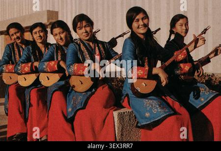 Soviet Central Asian female musicians playing string instruments, USSR, 1970s. Stock Photo