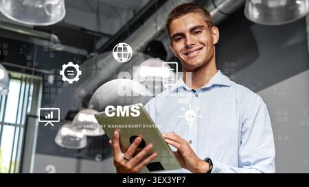 Person holding tablet while showing interest in a content management system concept Stock Photo