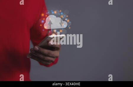 Young Man touch cloud computing diagram and laptop computer notebook in hand, Data storage, Cloud technology, Cloud Computing Storage Stock Photo