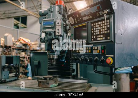 CNC machine control panel digital control with monitor for advance modern metal part manufacturing precision lathe tool workshop Stock Photo
