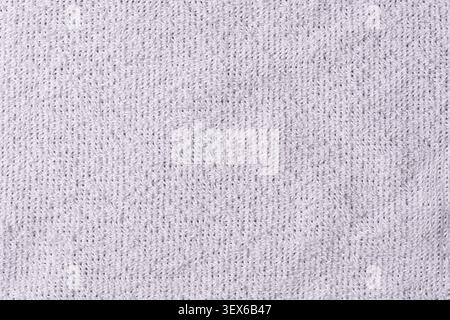 white bath towel full frame texture, fluffy terry cotton fabric surface with soft loops, comfortable spa background Stock Photo