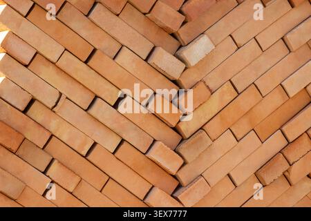 Clay bricks stacked. Close-up. Part of the frame. Stock Photo