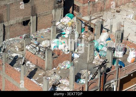 Rooftop piled with recycling sacks, Garbage City (Moqattam Village), Egypt Stock Photo
