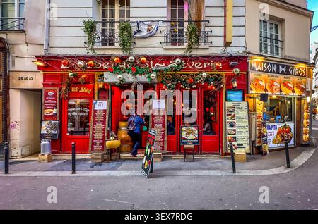 Paris, France, March 25th, 2025, restaurants on Saint-Severin street in the heart of the Latin Quarter in the 5th district of the capital Stock Photo