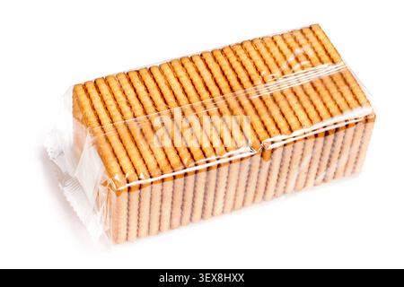 Packing cookies on a white background. Cookies are packed in cellophane. Stock Photo
