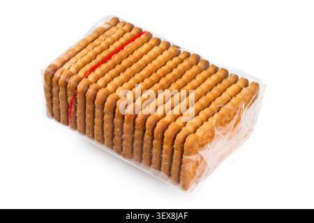 Transparent packaging of biscuits. A pack of cookies on a white background. Biscuits in cellophane packaging. Stock Photo