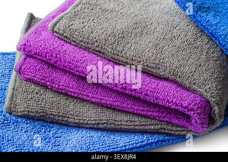 A set of folded microfiber towels close-up. Colorful Microfiber Cloths Stock Photo
